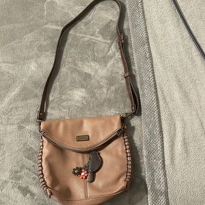 Small, faux leather, multi-pocket cross body bag from Chala.